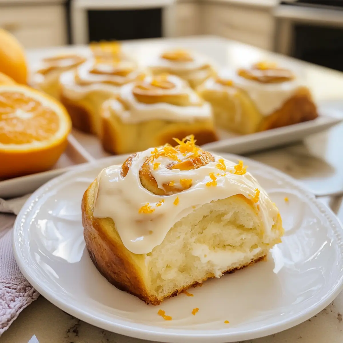 Orangenbrötchen mit Frischkäse-Frosting für Frühstück